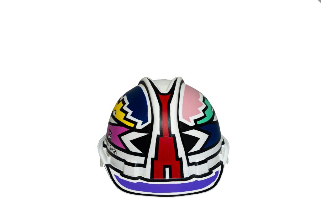 A Retrospective Unveiling: A Life of Artistic Brilliance 18 Esther Mahlangu. Helmet collection