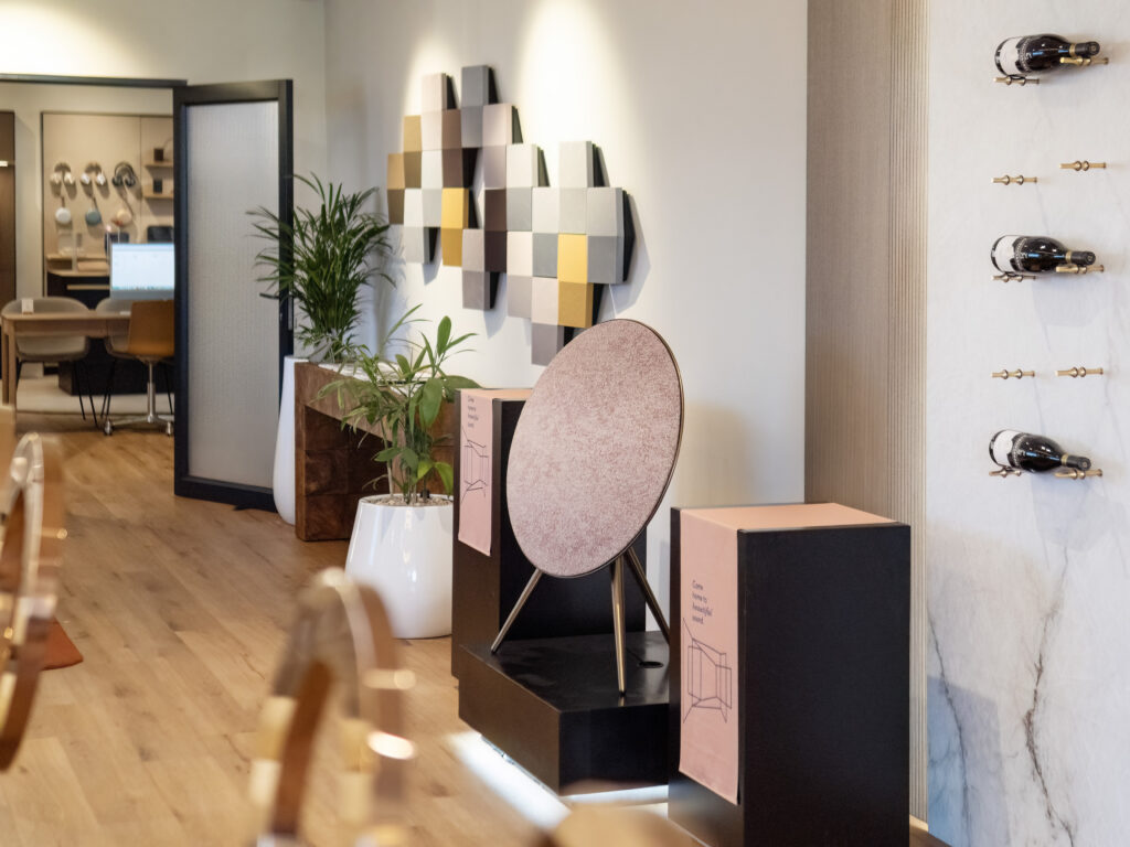 The Beosound A9 Sienna, finished in Sienna Brown and dressed in a Mineral Red Woolscape textile by Kvadrat Febrik and Front, at the Bang & Olufsen Experience Centre in Kramerville.
