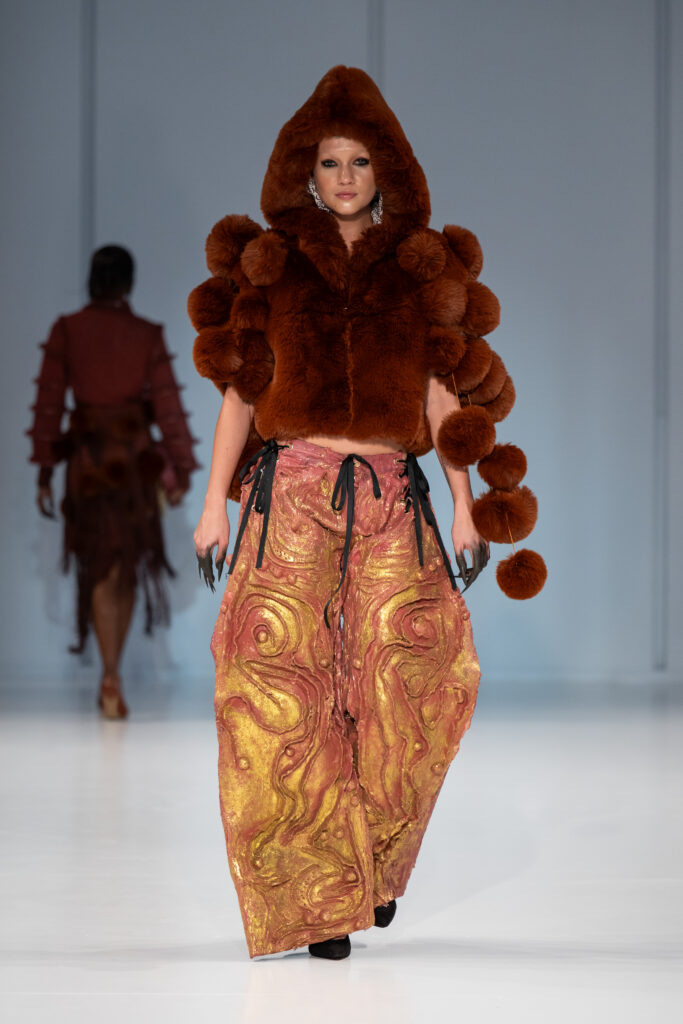 A look from Reflections, Gert-Johan Coetzee’s Autumn/Winter 2027 collection, which closed South African Fashion Week AW27 at The Forum, Hyde Park Corner